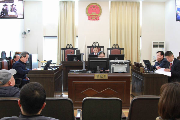 院长毛华庆独任审理案件开庭.JPG